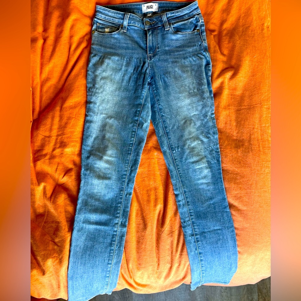 Skyline Mid Rise Faded Skinny Jeans
